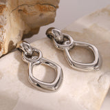 Aretes largos con diseño de rombo