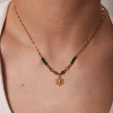 Collar dorado con dije de sol