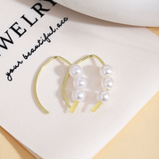 Aretes con perlas