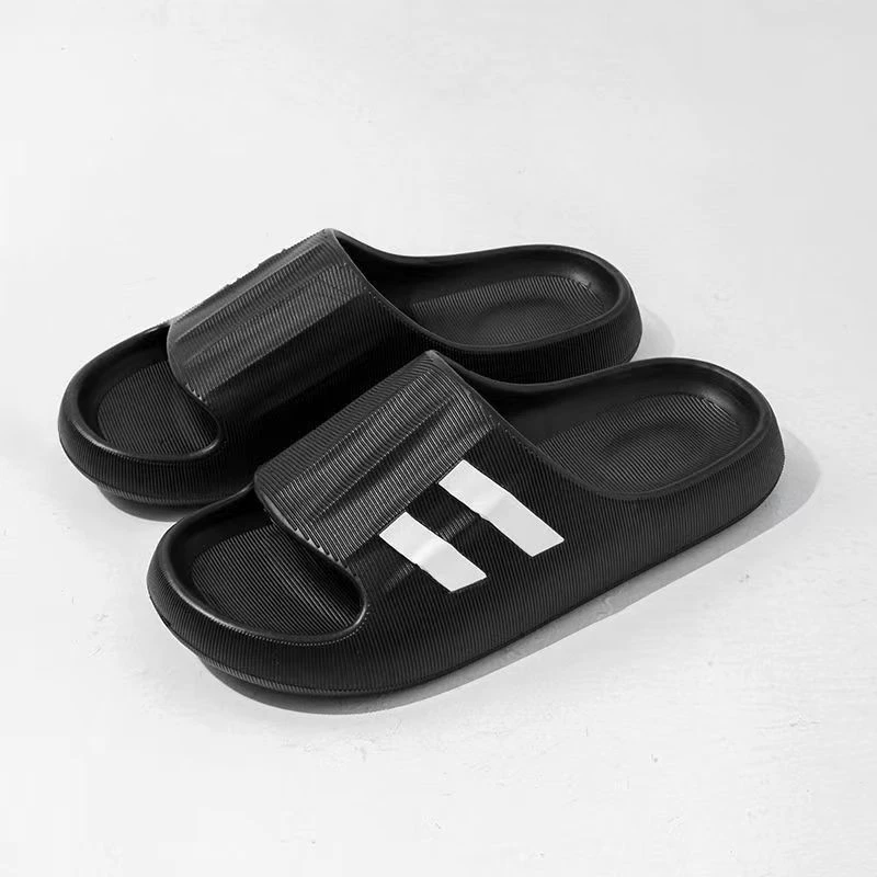 Sandalias tipo slide con líneas