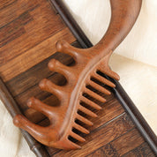 Peine masajeador de madera