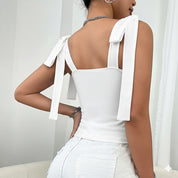 Blusa blanca de tirantes con lazos