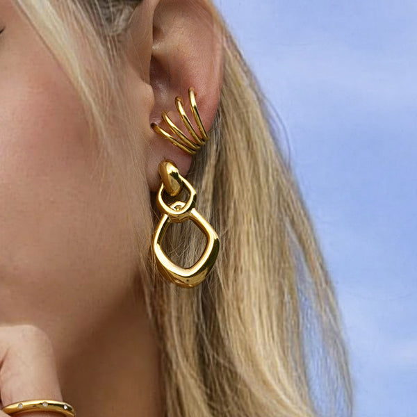 Aretes largos con diseño de rombo