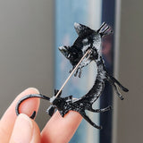 Broche de gato