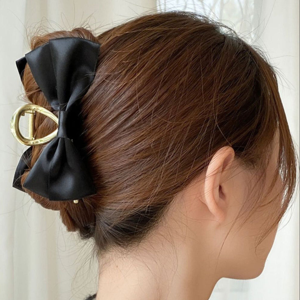 Gancho para cabello con diseño de moño