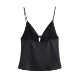 Blusa corta sin mangas escote con lazos