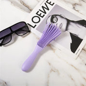 Cepillo desenredante flexible para cabello