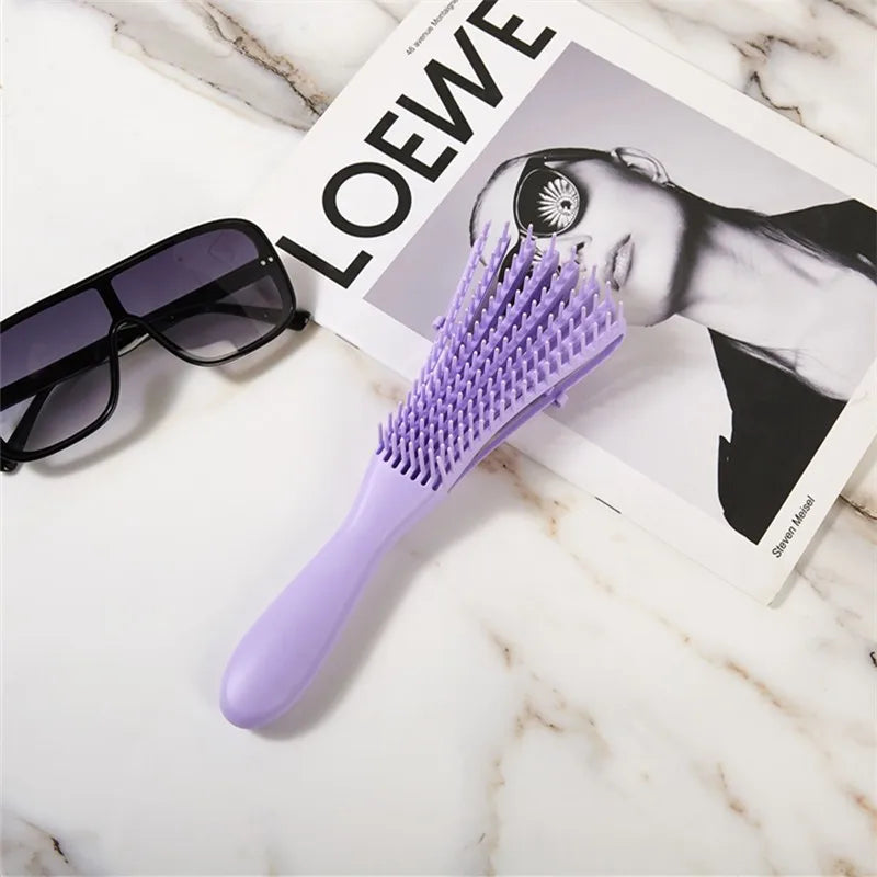 Cepillo desenredante flexible para cabello