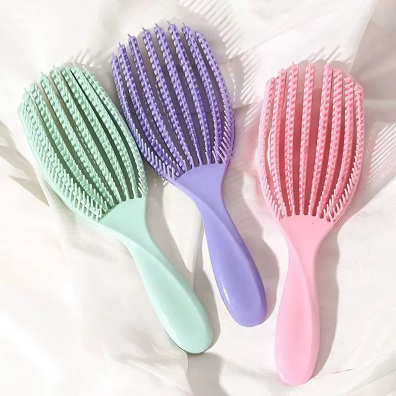 Mini cepillo desenredante flexible para cabello