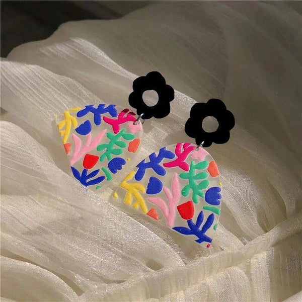 Aretes minimalistas de flores