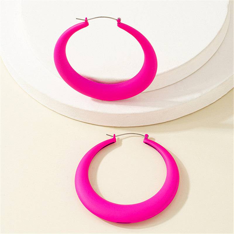 Argollas maximalistas fucsia