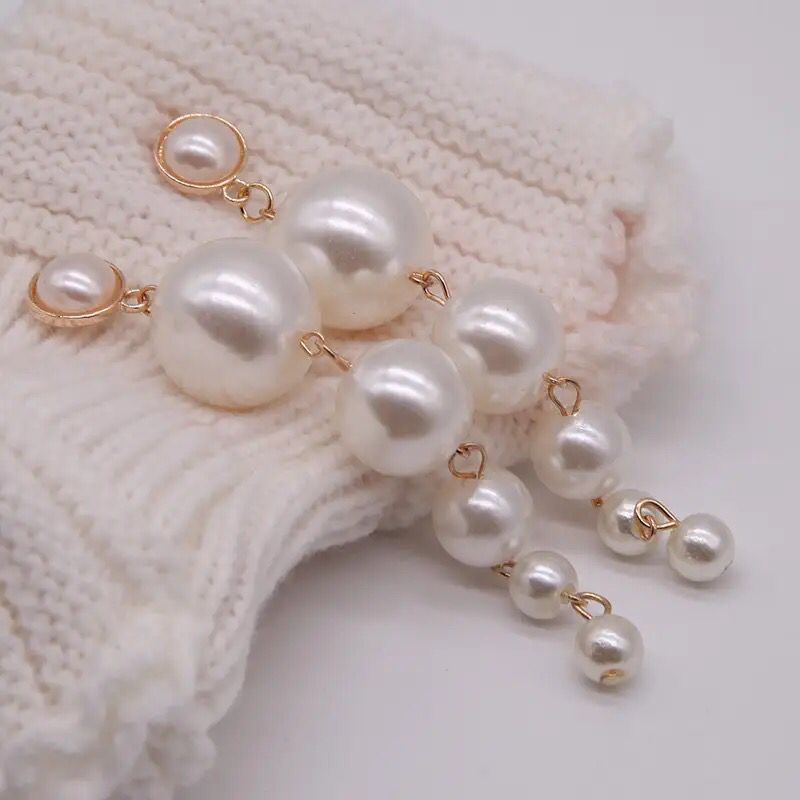 Aretes largo de perlas