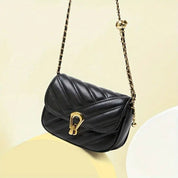 Bolso acolchado negro con cadena dorada - Dressygt