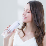 Irrigador bucal portátil con 4 boquillas