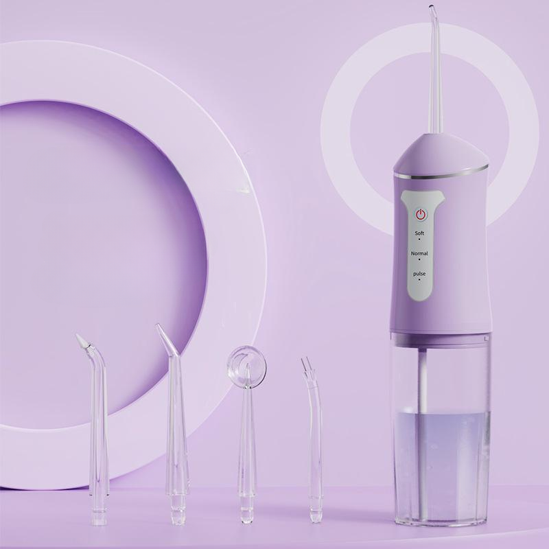 Irrigador bucal portátil con 4 boquillas