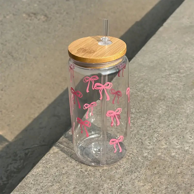 Vaso de vidrio con diseño de moñas
