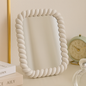 Espejo decorativo con marco trenzado - Dressygt