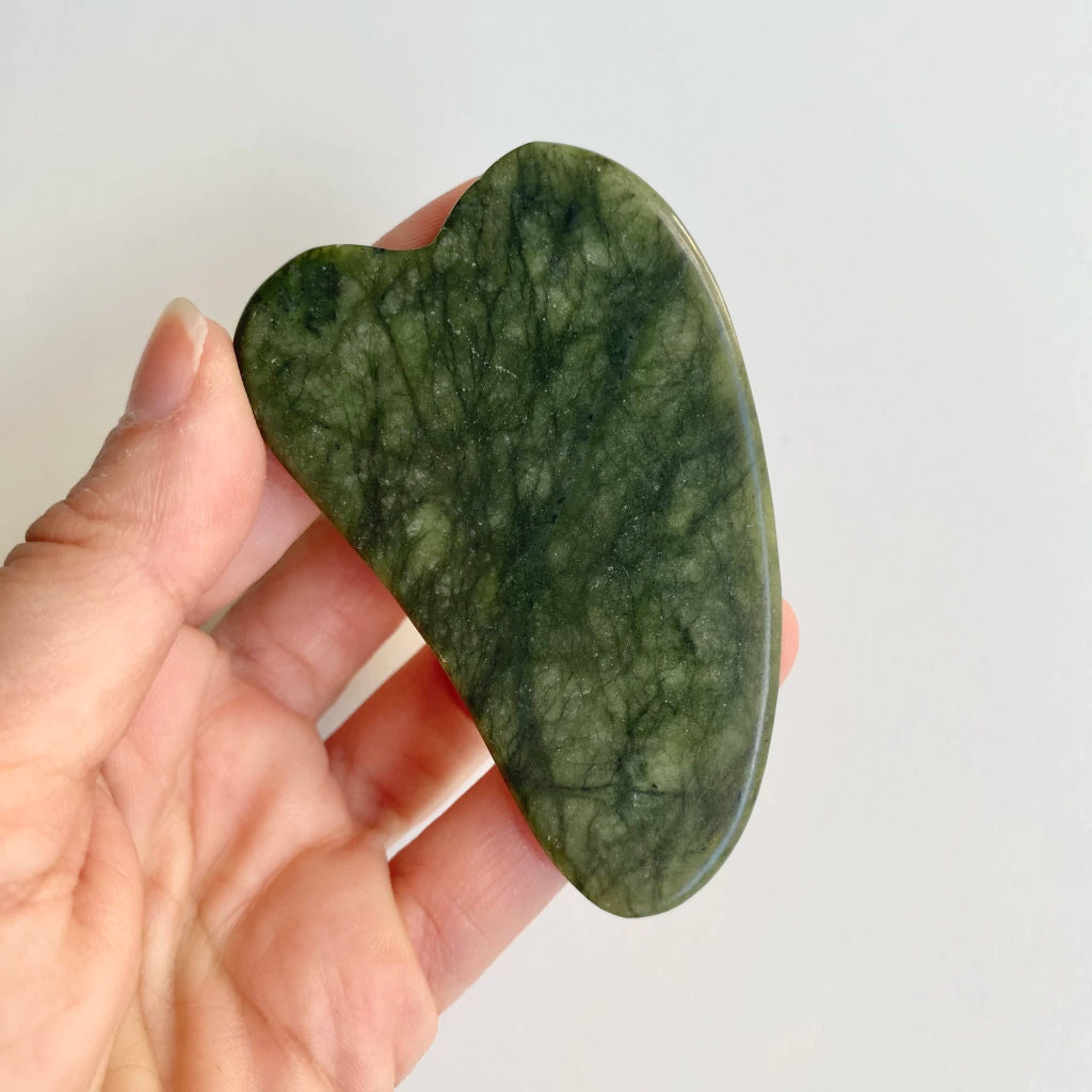 Masajeador facial Gua Sha