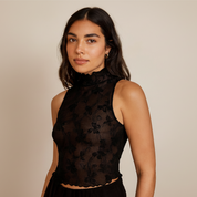 Top semi transparente con cuello alto - Dressygt