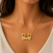 Collar con dije de niños dorado - Dressygt